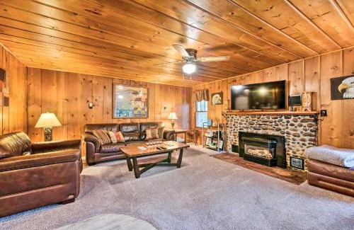 East Tawas House | Cozy East Tawas Cabin with Deck, Fire Pit & Child-Friendly Fun