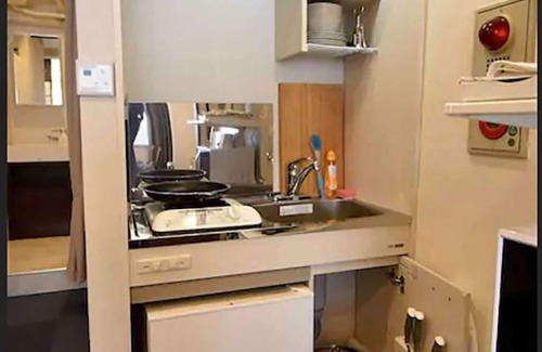 Nishishinbashi Apartment | Experience East Toranomon: Central Tokyo's Gem with Breakfast