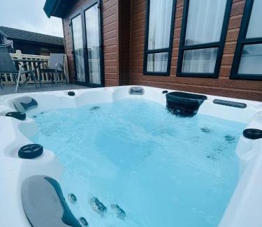 Malton House | Relax at Eastgate Lodge Featuring a Hot Tub Retreat
