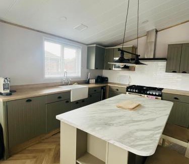 Malton House | Relax at Eastgate Lodge Featuring a Hot Tub Retreat