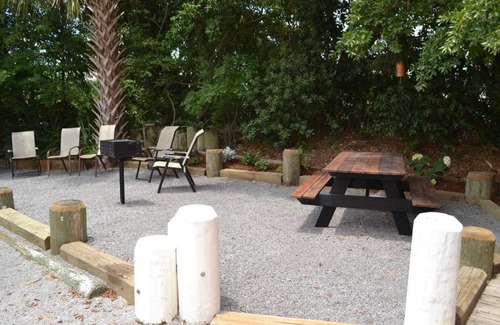 Isle of Palms Condo | Beachside Bliss: 2BR Retreat, Pet-Friendly & Pool Access