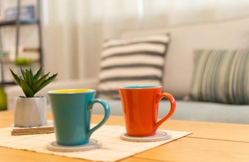 Ilioupoli Apartment | Relaxing Oceanfront Escape with Breakfast & Kids' Fun