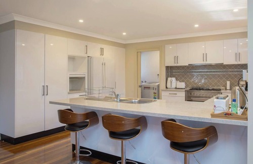 Wyong House | Relaxing Poolside Retreat on Wyong River with Pet-Friendly Options