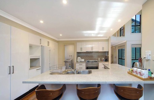 Wyong House | Relaxing Poolside Retreat on Wyong River with Pet-Friendly Options