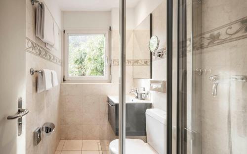 Locarno Hotel | Elegant Getaway at EasyRooms ai Monti with Ocean Views