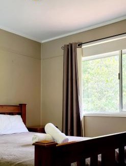 Eatons Hill House | Relax at Eatons Retreat: 4-Star Stay with Pool & Breakfast
