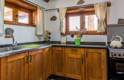 Haria House | Family-Friendly Eco Barn with Pool, Steps from Golden Beach