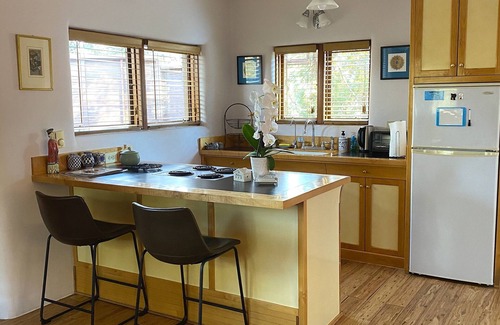 Canoncito House | Eco-Friendly Retreat: Pet Friendly with Pool & Spa Amenities