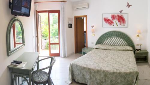 Fetovaia Hotel | Eco Hotel Montemerlo: Pet-Friendly Oasis with Ocean Views