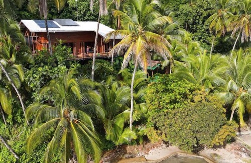 Bouvet Island House | EcoHouse: Nature Retreat with Scenic Caribbean Sea Views