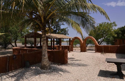 Diakhanor Cabin | Relax at Ecolodge de Palmarin: Pool & Family-Friendly Stay