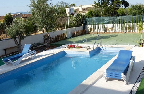 Palma de Mallorca House | Eco-Friendly Villa in Palma: Pool, Orchard & Sports Court