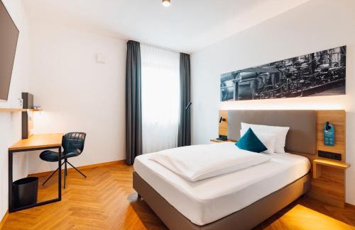 Heidenheim an der Brenz Hotel | Discover ECOME Hotel: Family-Friendly with Great Amenities