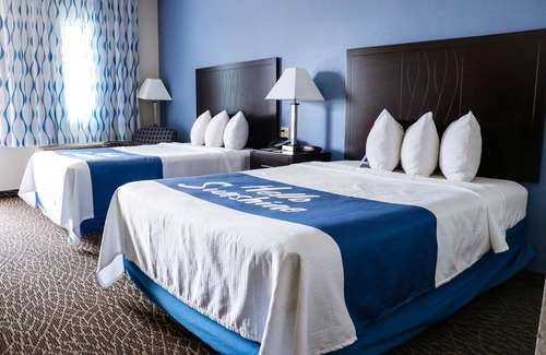 Bryan Hotel | Budget-Friendly Days Inn by Wyndham Bryan - Family Amenities Included