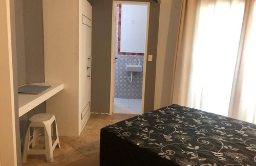 Caponga House | Cozy Economy Suite with Pool & Pet-Friendly Amenities