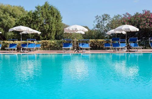 Teulada Apartment | Relaxing Ecovillage with Pool and Private Outdoor Spaces