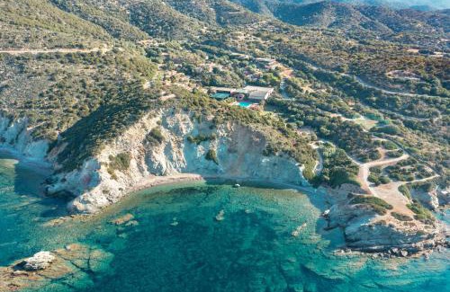 Teulada Apartment | Relaxing Ecovillage with Pool and Private Outdoor Spaces