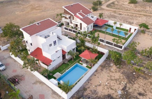 Cheyyur Villa | Relax at ECR Inn: Family-Friendly with Pool & Breakfast