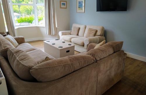 Hele House | Experience Eddies by the Sea: Oceanfront Getaway with a 9.8 Rating