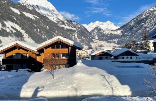 Matrei in Osttirol Ski Chalet | Relax at EdelWeiss AlpinLodge: Guest Rated 9/10 with Ocean Views