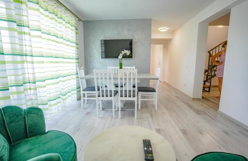 Tirgu Mures Apartment | Explore Eden Penthouse 5: Family-Friendly & Top Rated