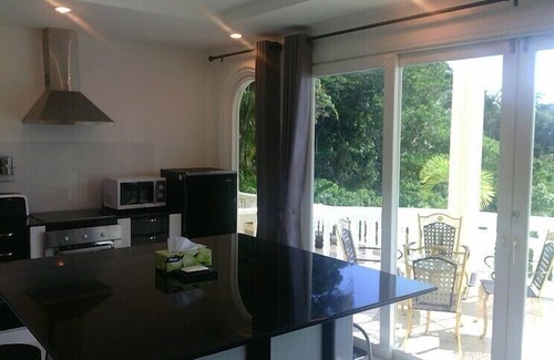 Karon Apartment | Idyllic Eden Resort: Oceanfront Bliss with Family Amenities
