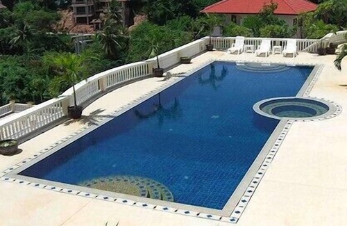 Karon Apartment | Idyllic Eden Resort: Oceanfront Bliss with Family Amenities