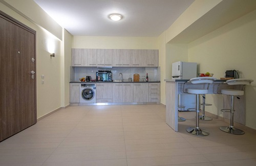 Petaloudes Apartment | Discover Eden's Lily: Sea View Apartment with Spa Amenities