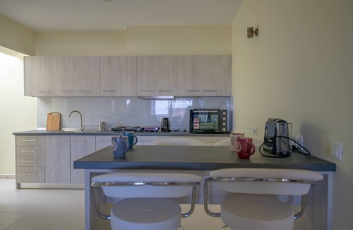 Petaloudes Apartment | Bright Eden's Sunflower Apartment with Sea View & Breakfast