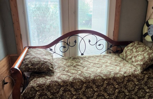 Alpena Cottage | Relax at Edge of Brothers Bay on Long Lake, Alpena