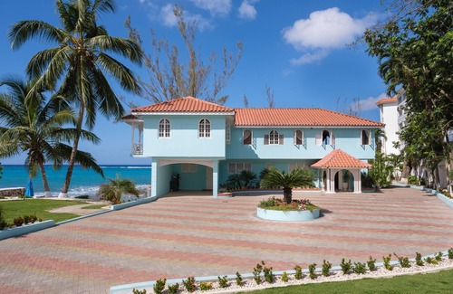 Tower Isle Villa | Family-Friendly Edgewater Beach Villa with Oceanfront Bliss