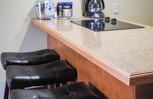 Charlevoix Condo | Discover #102 at Edgewater Inn - Waterfront Retreat Awaits