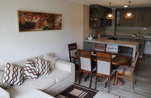 Isla Quinchao Apartment | Elegant Oceanfront Retreat at Edificio B with Spa & Pool