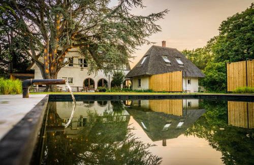 Rotsenheirweg House | Pet-Friendly Edville Home with Pool and Hot Tub