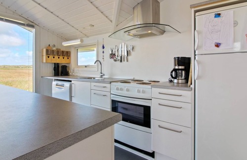 Blavand Strand House | Relax at Edyta: Oceanfront Retreat Steps from the Sea