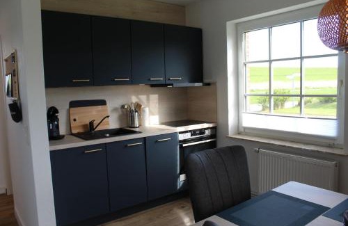 Norderhafen House | Oceanfront Haven: Een A Uthlande with 8.8/10 Rating