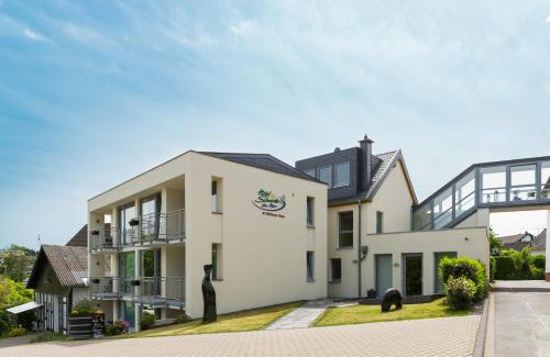 Schalkenmehren Hotel | Relax at Eifel Hotel Schneider with Ocean Views & Spa