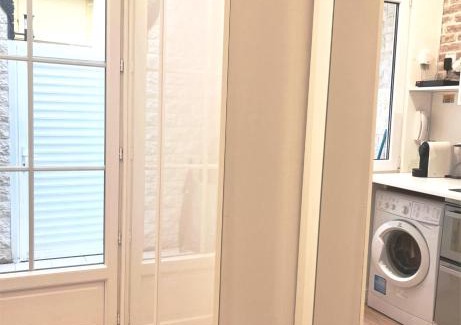 Faubourg Saint-Germain Apartment | Elegant Eiffel Tower Studio with Patio - Rated 8.5/10
