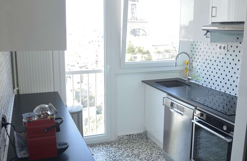 Grenelle Apartment | Designer Apartment with Eiffel Tower Views & Pool Access