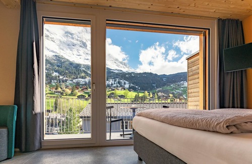 Grindelwald Hotel | Experience Eiger Lodge Chic: Guest Rated 9.4 with Spa & Pool