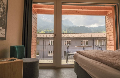 Grindelwald Hotel | Experience Eiger Lodge Chic: Guest Rated 9.4 with Spa & Pool