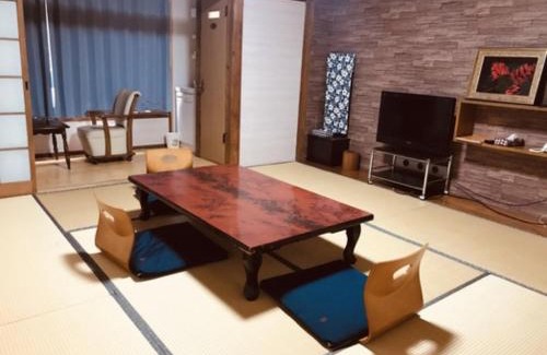 Amakusa Hotel | Discover Eimiya Ryokan: Family-Friendly Retreat with Hot Tub