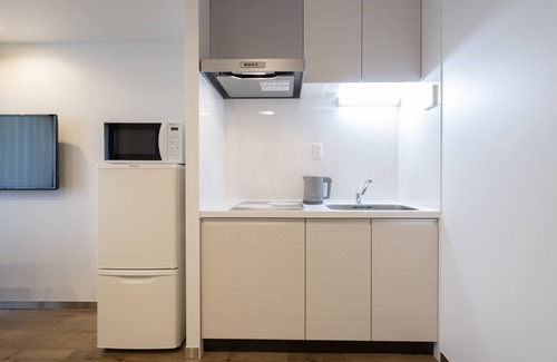 Toshima Hotel | Discover Eisei Stay: Eco-Friendly & Family-Friendly Escape