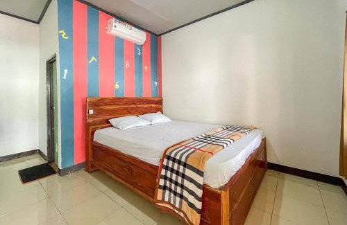 Jerowaru House | Relax at Ekas Beach Guesthouse with Oceanfront Views
