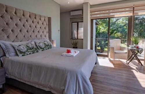 La Lucia House | Discover Ekuthuleni: Modern Guesthouse with Seaview & Pool