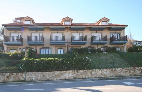Comillas Apartment | Relaxing Oceanfront Apartment with Pool & High Guest Rating