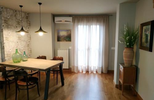 Arguedas Apartment | El Bordon: Highly Rated Getaway for Families and Pets