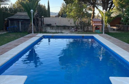 Antequera House | Discover El Carmen: Family-Friendly Retreat with Pool