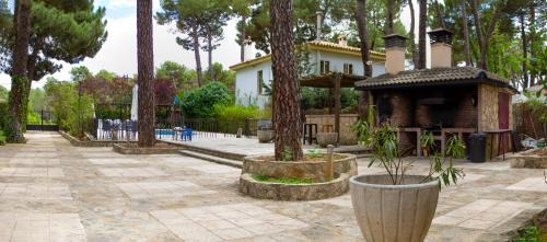 Jabaga House | Discover El Chalet del Pinar: 4-Star Oceanfront Retreat
