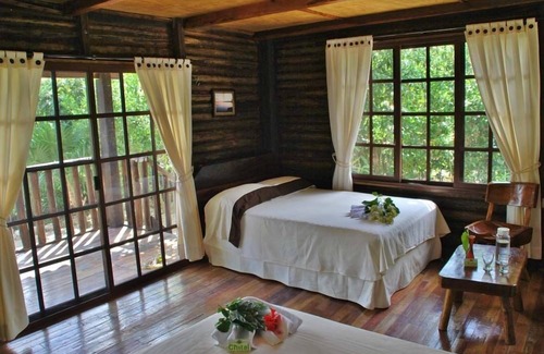 Raudales Hotel | Experience El Chital: Poolside Relaxation and Spa Retreat